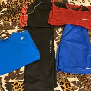 Three Reebok shirts, 1 shorts and 1 pants